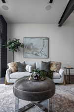 Living room featuring wood finished floors and baseboards