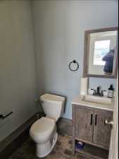 Bathroom with vanity and toilet in shop