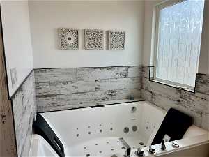 Bathroom with tile walls