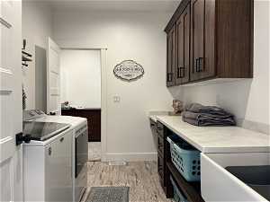 Laundry room connects through to  primary closet