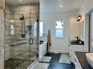 Bathroom with, separate shower and tub, and vanity