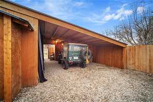 Exterior space with a carport