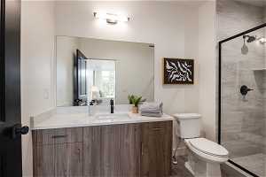 3rd floor primary ensuite. Photo is from a similar unit in the development. Some fixtures may differ