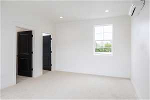 4th floor family room. Photo is from a similar unit in the development. Some fixtures may differ