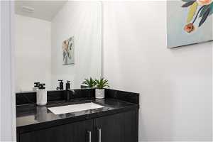 2nd floor powder room. Photo is from a similar unit in the development. Some fixtures may differ