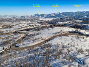 Snowy aerial view with a mountain view