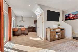 ADU Interior space with light hardwood / wood-style flooring and sink