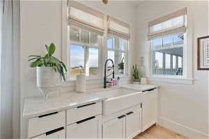 Kitchen sink with views of the lake