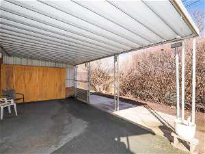 Nice covered patio off kitchen and garage.