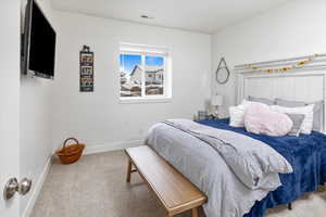 View of carpeted bedroom