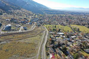 Birds eye view of property with a mountain view