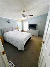 Master with more natural light, ceiling fan and on the opposite side of the home from the other bedrooms.