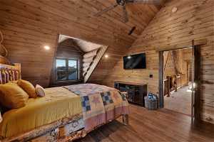 Bedroom featuring vaulted ceiling, wooden ceiling, dark hardwood / wood-style floors, and ceiling fan