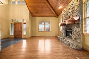 FLOORING IS STAINED LIGHTER THAN SHOWN IN PHOTO