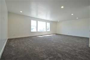 View of carpeted huge family room.