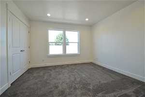 View of carpeted bedroom room.