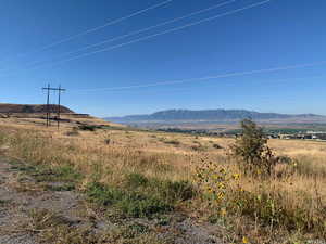 Property view of mountains featuring a rural view