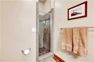 Masster Bathroom with a shower with door