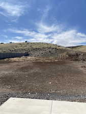View of yard with a rural view