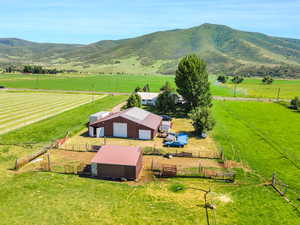 Drone / aerial view with a rural view and a mountain view