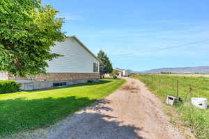 View of road featuring a mountain view and a rural view