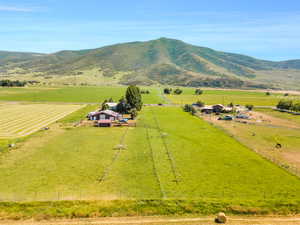 Drone / aerial view with a rural view and a mountain view