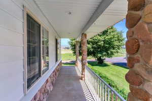 View of patio featuring covered porch