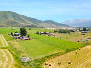 Property view of mountains with a rural view