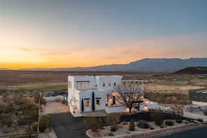 View of front of home featuring a mountain view