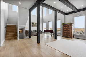 Interior space with plenty of natural light and light hardwood / wood-style floors