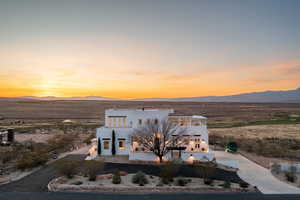 View of front of home featuring a mountain view