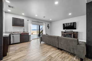 Living room with light wood-type flooring