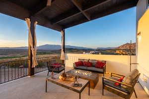 View of terrace featuring a mountain view, a balcony, and outdoor lounge area