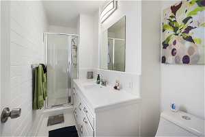 Master Bathroom with a Shower and large vanity.