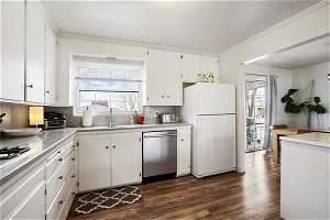 Kitchen , stainless steel dishwasher,  hardwood  flooring, a wealth of natural light,