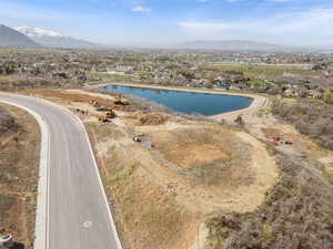 Bird's eye view featuring a water and mountain view
