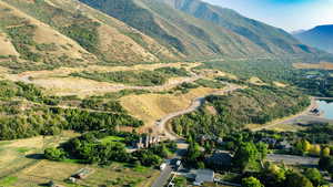 Birds eye view of property with a mountain view