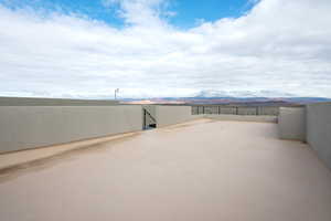 View of patio / terrace with a mountain view