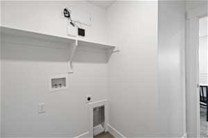 Laundry room with washer hookup and hookup for an electric dryer