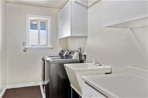 Laundry Room with utility sink and cabinets