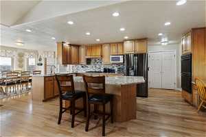Gourmet kitchen with updated appliances and granite countertops