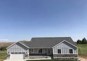 View of front of home featuring a garage