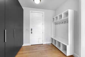 Mudroom featuring light hardwood / wood-style floors