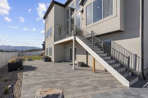 View of patio / terrace with a mountain view and central air condition unit