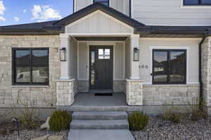 Property entrance featuring a porch