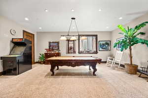 Rec room featuring pool table and light carpet