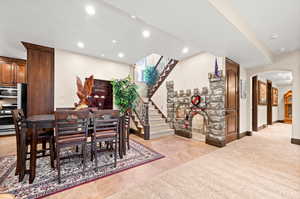 View of carpeted dining room