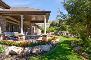 View of yard with a patio area