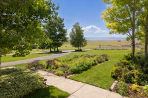 Surrounding community with a lawn and a rural view