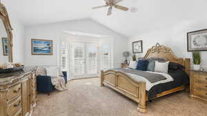 Primary bedroom with French doors to backyard